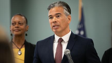 Image of Attorney General Rob Bonta speaking at microphone
